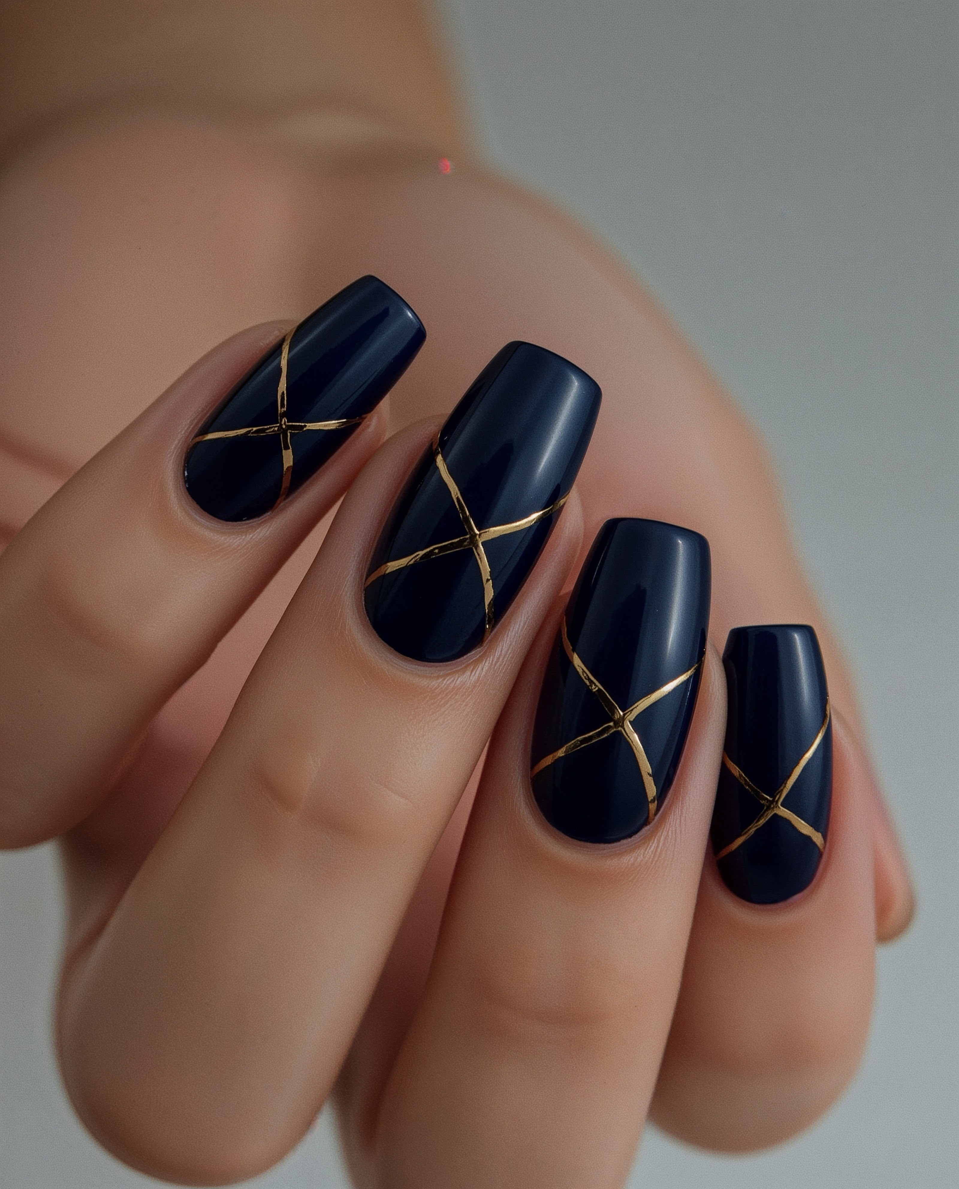 Glamorous Navy Stiletto Nails with Gold Line Art